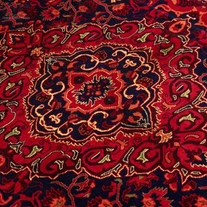 فرش دستباف شش متری عشایری زمینه سرمه ای بافت افغان کد D02136A